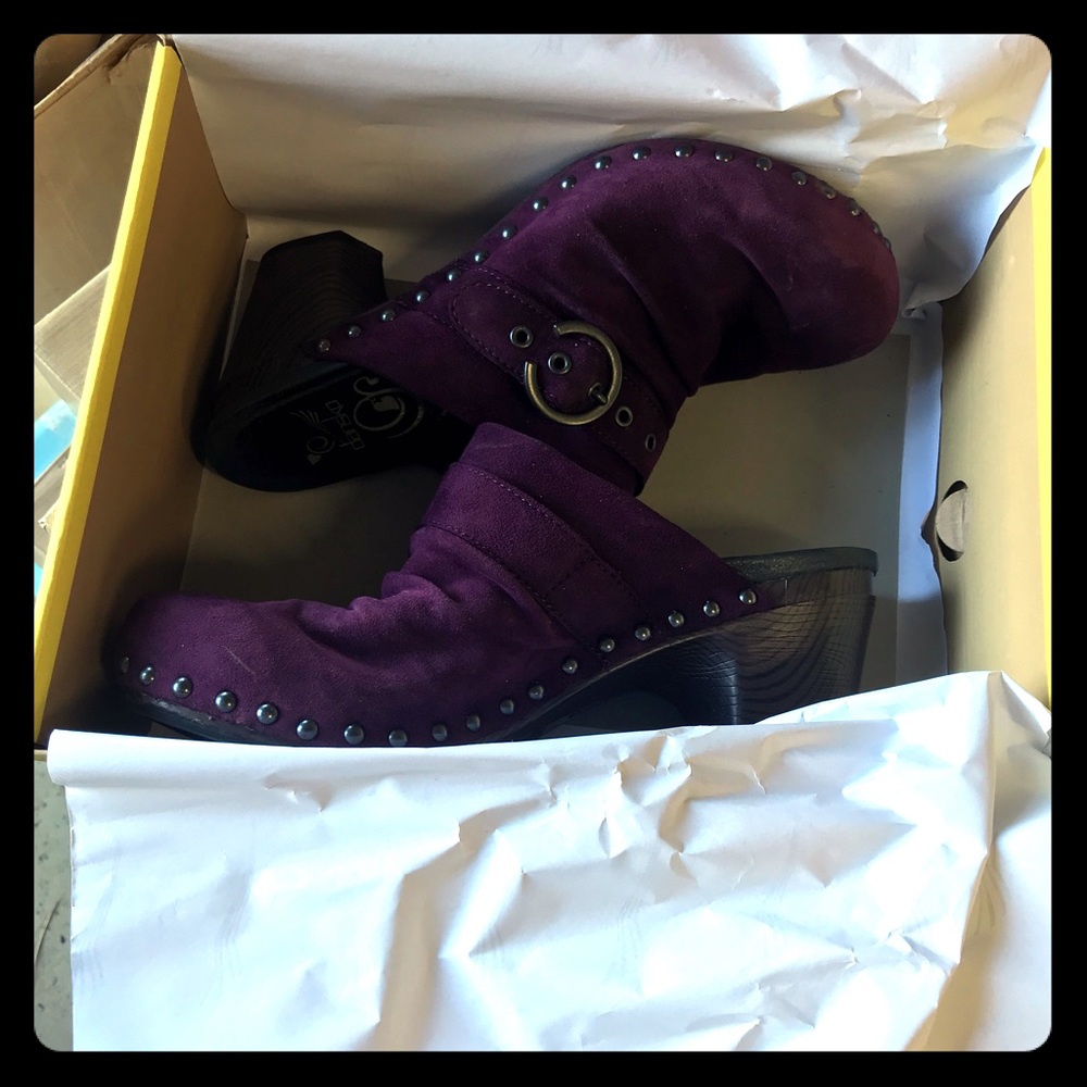 Dansko purple suede clogs.